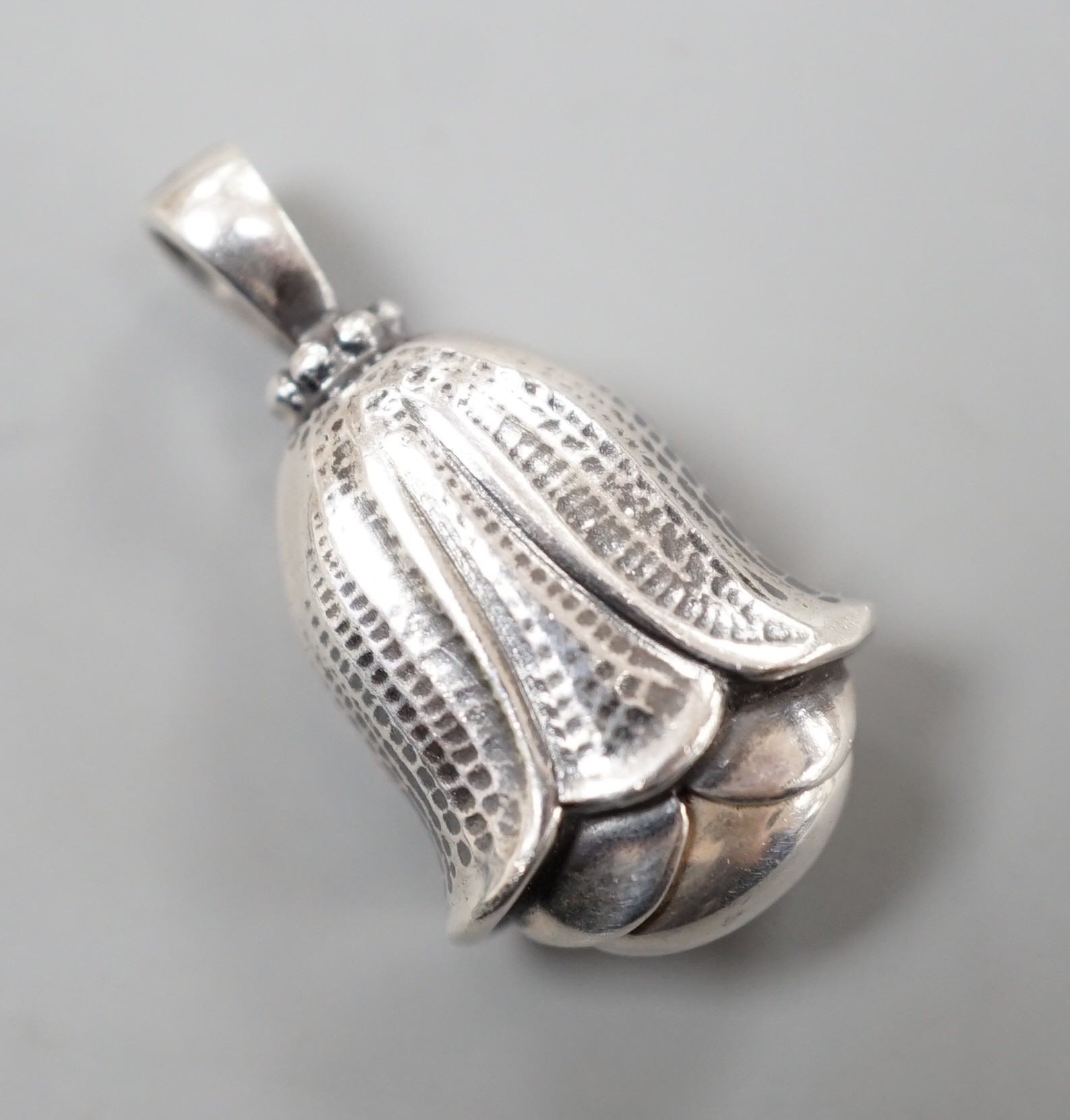 A Georg Jensen sterling artist pendant for the year 2007, of tulip form, 26mm.